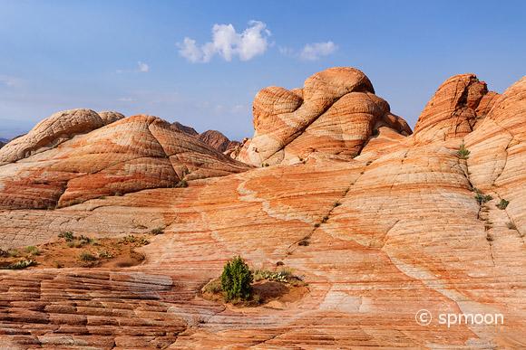 Yant Flat - red, orange, and white unsusal striped rock formation in Southern Utah.