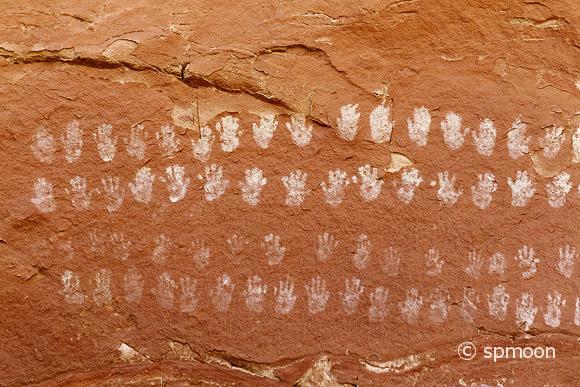 Many hands pictograph on sandstone wall near Escalante River, Southern Utah